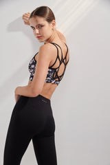 All about unique designs, comfort, support and performance.   This is our RAIA signature lattice criss cross back design that embraces your movement and enhances your back silhouettes. This on-trend high neck bra has a chic cropped fit with full coverage as well as mesh paneling for an extra air flow. 